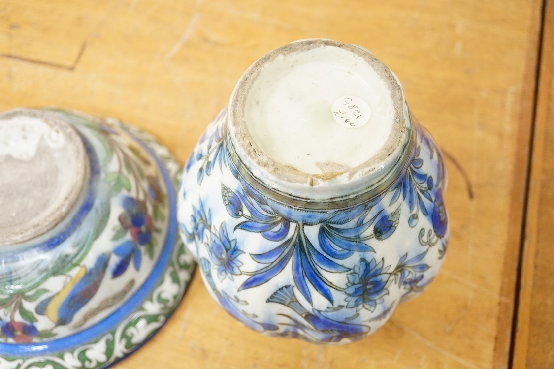 A Persian bird painted fritware lobed vase, 19.5cm high and a similar bowl, Qajar dynasty (2)